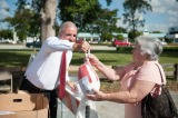 Photo-op: Carlos Gimenez plays turkey with Miami Dolphins