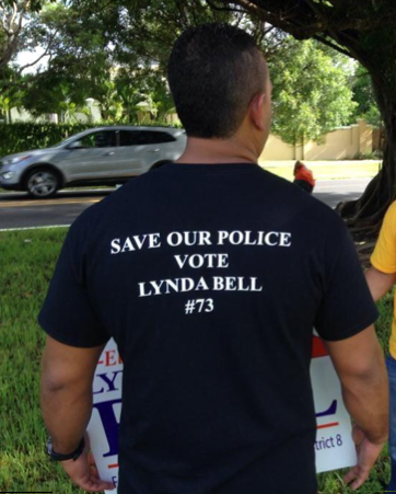 Lynda Bell misleads with imposter cops to keep office