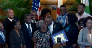 Jean Monestime celebrates the moment with family