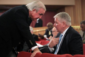 STAND OFF? A Miami Herald photographer caught the mayor and Bill Johnson at a January meeting in what looks like a small disagreement.
