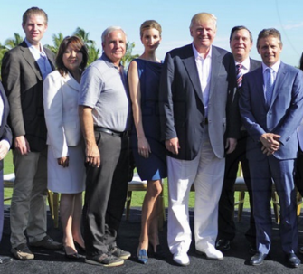 Carlos Gimenez stands next to Ivanka Trump and her dad, Donald Trump at the unveiling of Doral's Blue Monster in February, 2014. Did they catch up on the proposal? 