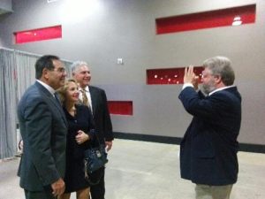 Attorney Steve Cody takes aim of a different kind at Xavier Suarez and two fans at Saturday's dinner