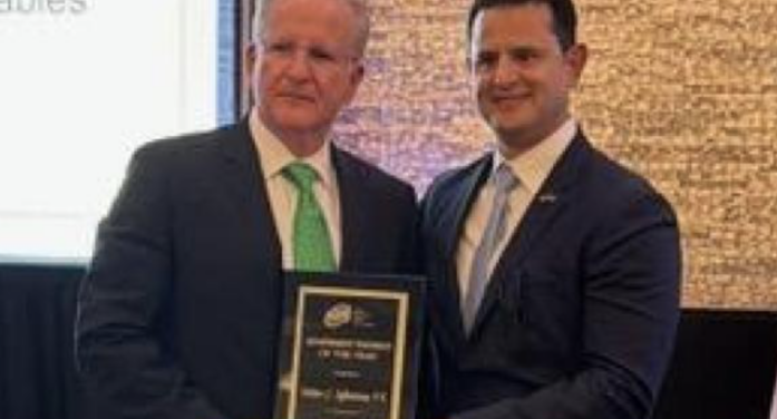 Was ‘Engineer of the Year’ a reward for a special sidewalk in Coral Gables?