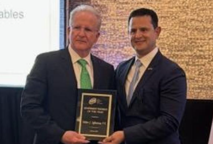 Was ‘Engineer of the Year’ a reward for a special sidewalk in Coral Gables?